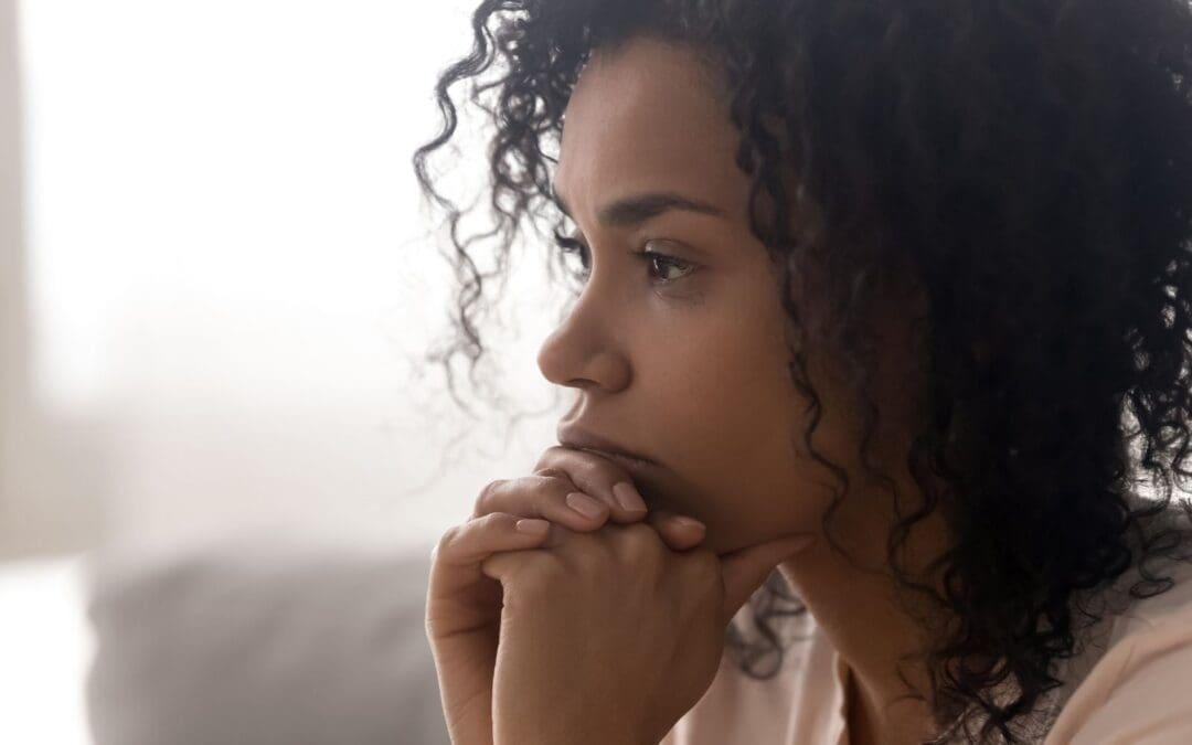 a woman pensive about her abortion